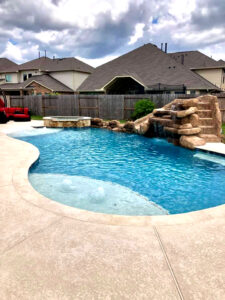 Custom Pool in Katy with Water feature Slide